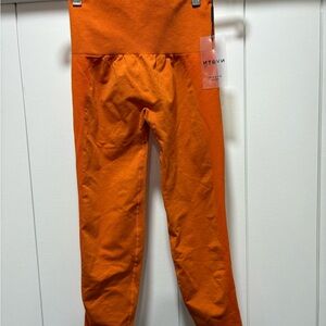 NVGTN Sunset Orange Curve Contour Leggings Small Athletic  Compression Seamless